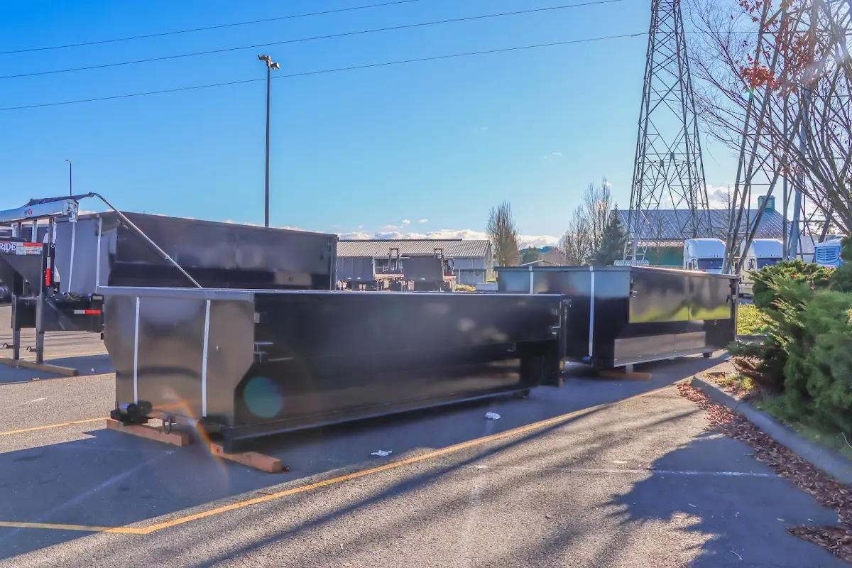 Roll-off dumpster ready for waste disposal at job site for 15 Yard Dumpster Rental in Kalispell